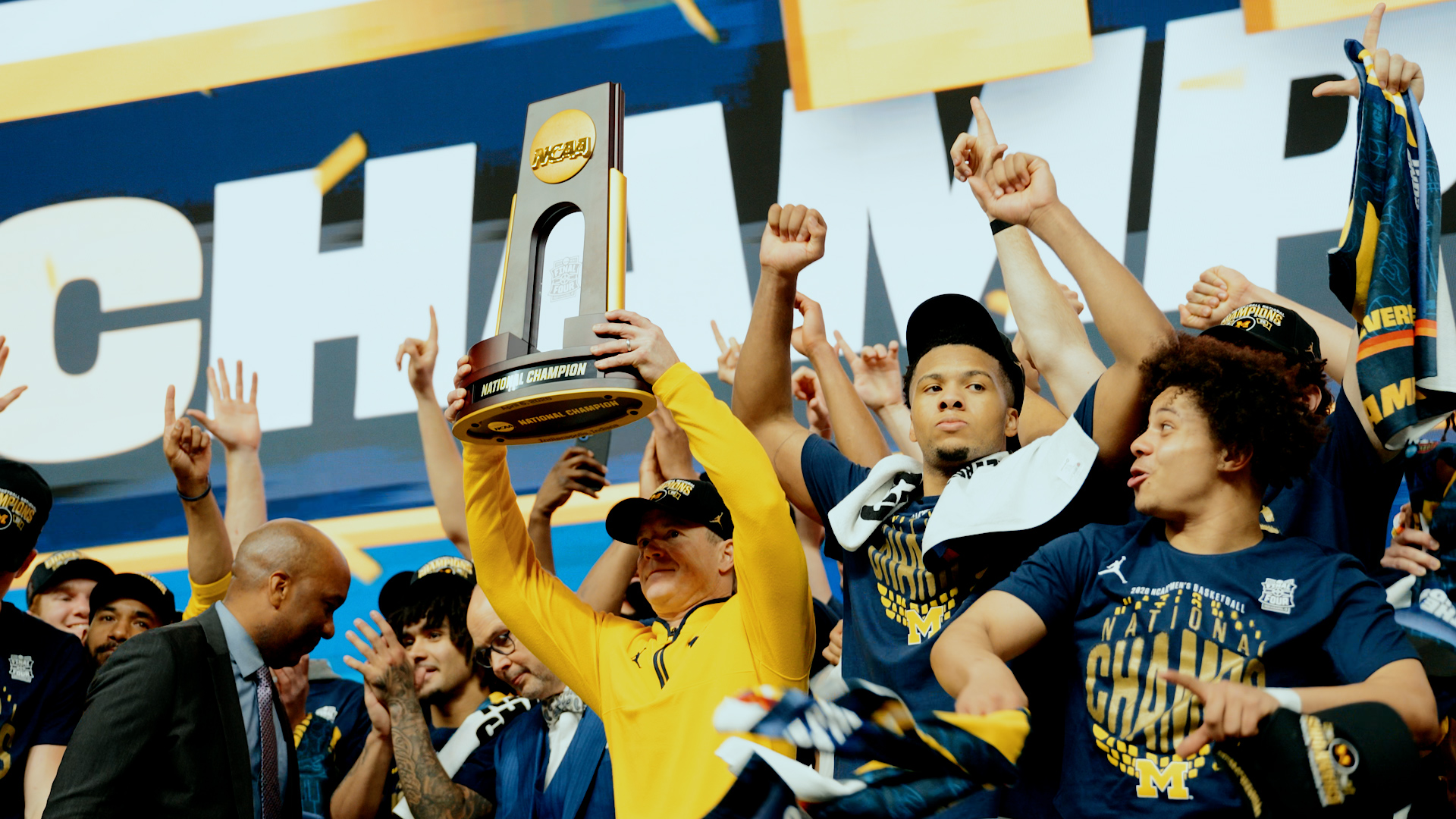 Michigan basketball celebrating a national championship